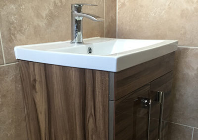 An upgrade to a bathroom, en suite and a cloakroom by the Marshall & McCourt team
