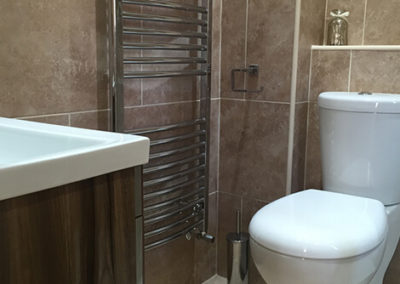 A bathroom, en suite and a cloakroom revamp by Marshall & McCourt
